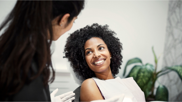 woman smiling in dentist office